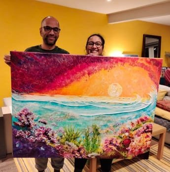 Happy recipients of a latest painting commission